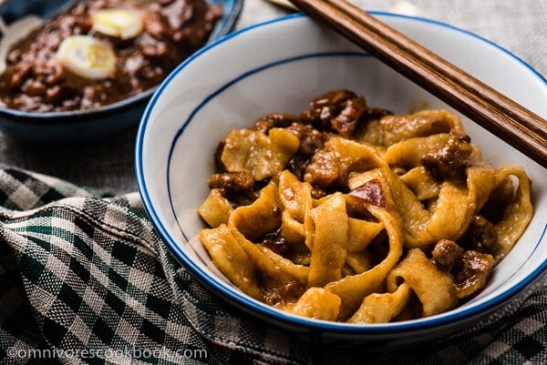Zha Jiang Mian (炸酱面) - the pork and onion is cooked in a mouthwatering sweet savory sauce, a classic noodle dish of Beijing| omnivorescookbook.com