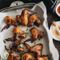 Juicy crispy honey soy baked chicken wings that are not only easy to make but also way healthier than takeout. #asian #wings #party #gameday #glutenfree #recipes