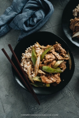 Pork Stir Fry with Pepper served on one plate with rice