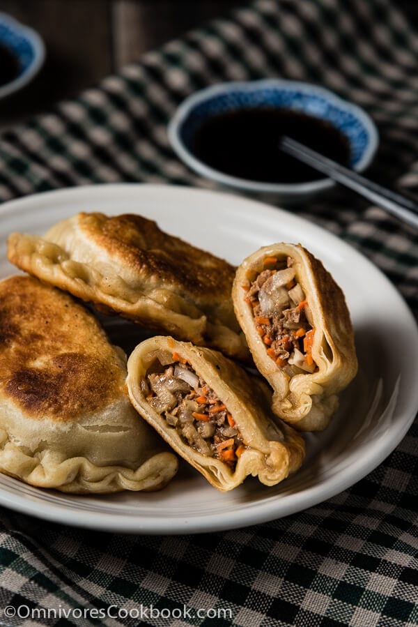 Beef Meat Pie (牛肉馅饼) - A classic northern Chinese pastry. It has a moist savory filling and a crispy crust. It’s a large version of the potsticker and tastes even better! | omnivorescookbook.com