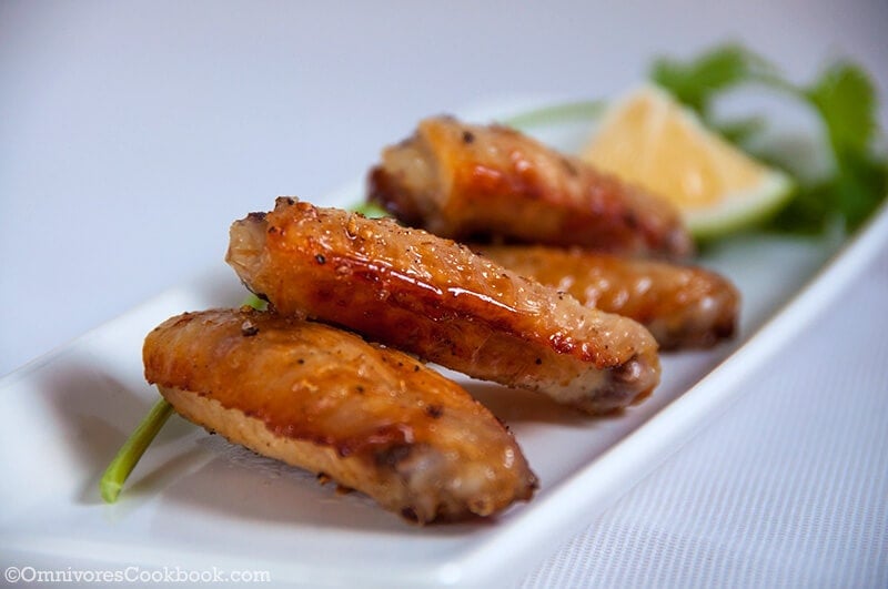 Crispy baked chicken wings - Only require four-ingredient and 30 minutes to get ready. The wings have a charred and crispy skin with a moist texture! | omnivorescookbook.com
