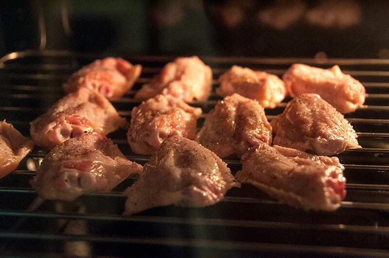 Crispy baked chicken wings - Only require four-ingredient and 30 minutes to get ready. The wings have a charred and crispy skin with a moist texture! | omnivorescookbook.com