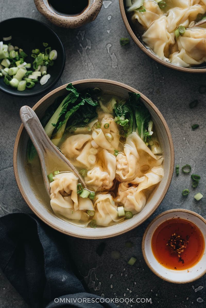 Wonton soup with pork and shrimp wonton soup served in a hearty chicken soup