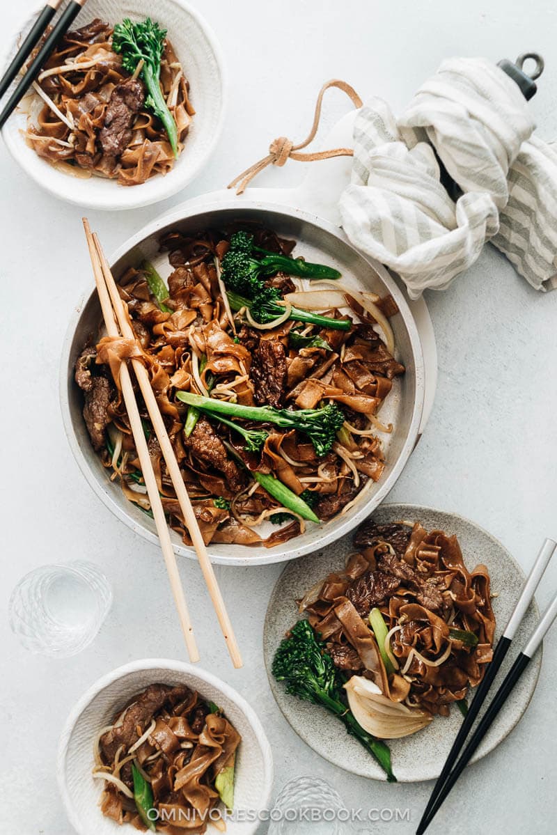 This beef chow fun is loaded with fat noodles, tender steak, and crisp veggies. Even better, now you can cook restaurant-style fried noodles in your home kitchen with a flat skillet! {Gluten-Free Adaptable}