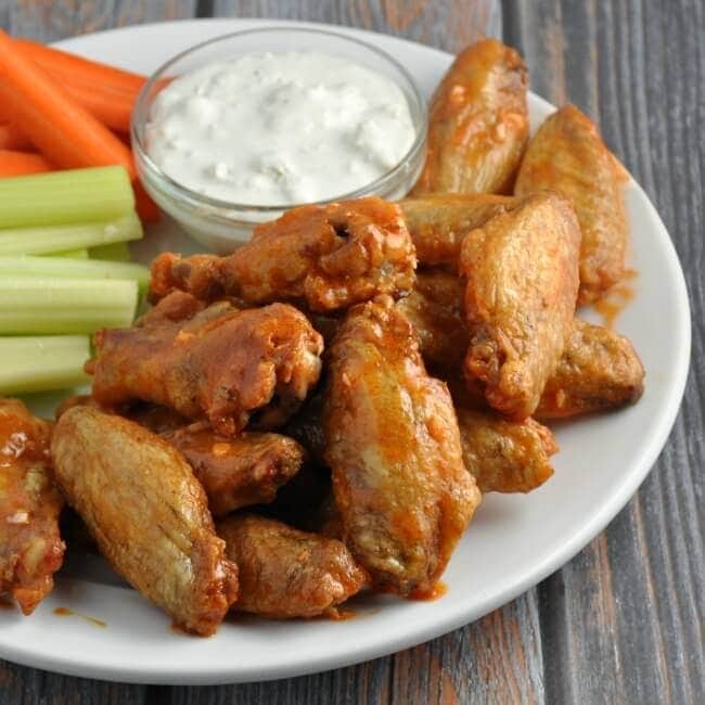 15 Chicken Wings Recipes that Will Blow your Mind - Crispy Baked Buffalo Wings with Homemade Buffalo Sauce