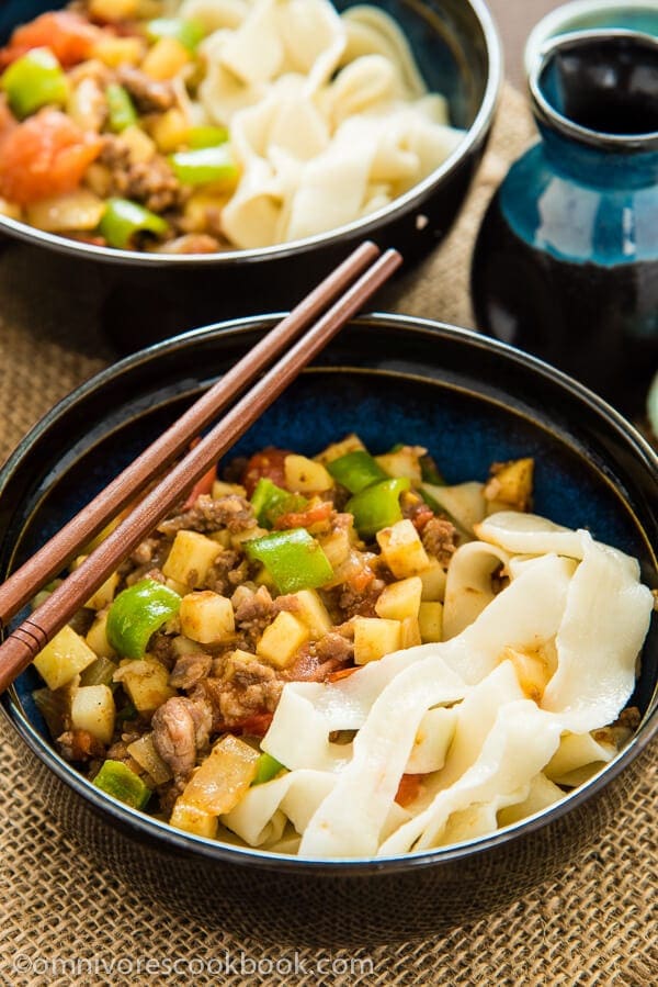 The tender ground lamb meat is cooked with potato, tomato, onion, and pepper to create a simple, colorful, and delectable noodle sauce - Uyghur-Style Noodles with Lamb Sauce (Laghman, 新疆拌面) | omnivorescookbook.com