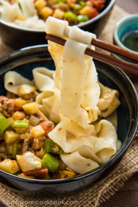 The tender ground lamb meat is cooked with potato, tomato, onion, and pepper to create a simple, colorful, and delectable noodle sauce - Uyghur-Style Noodles with Lamb Sauce (Laghman, 新疆拌面) | omnivorescookbook.com