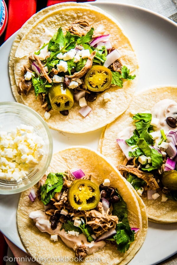 Pulled Chicken Tacos - Adding some chicken thigh into braised pork, you can create this rich, moist and tender pulled chicken effortless! | omnivorescookbook.com