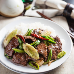 Scallion Beef Stir Fry (葱爆牛肉) - The beef is tender, moist, and caramelized as it cooks in a sweet savory sauce. It takes only 15 minutes to prep and cook! | omnivorescookbook.com