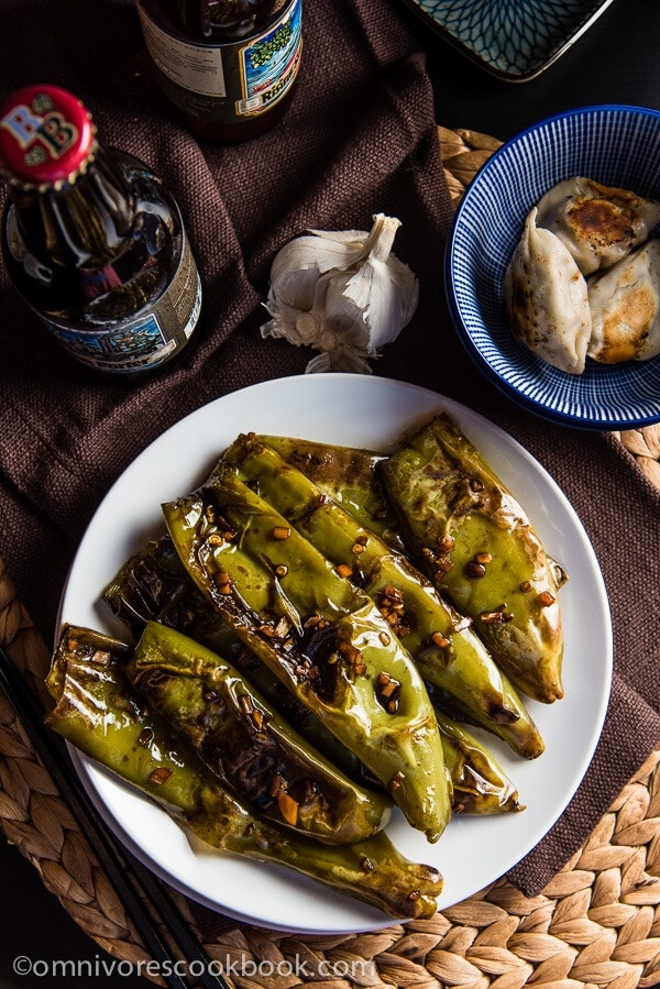 Szechuan Pan Fried Peppers (Tiger Skin Peppers, 虎皮尖椒) - These peppers are pan fried until blistered and tender, then cooked in a sour, savory sauce. A great vegan dish that is hot, flavorful, and appetizing! | omnivorescookbook.com