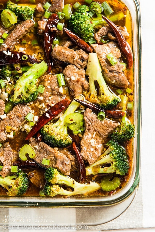 Authentic Szechuan Poached Beef (水煮牛肉) - The beef is melt-in-your-mouth tender. The numbing spiciness is so addictively good that you cannot stop eating, even if it makes your stomach burn. | omnivorescookbook.com