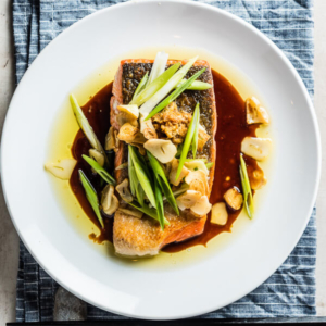Crispy Salmon with Ginger Soy Sauce - This recipe combines the delicate flavor of Chinese steamed fish with the crispy skin of grilled salmon in one dish. Isn’t it perfect? | omnivorescookbook.com