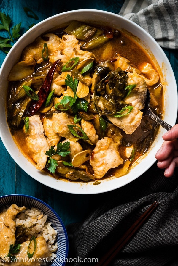 Suan Cai Yu (酸菜鱼, Sichuan Fish with Pickled Mustard Greens) - The fish is sliced thinly and poached in a rich broth made from chicken stock, fish stock, and Sichuan pickles. | omnivorescookbook.com