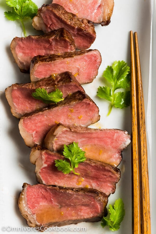 Sous Vide Steak Sashimi with Ponzu Dressing - Sous vide steak yields perfect results every single time. This post introduces the easiest approach, in which the steak is cooked in the oven without special equipment. | omnivorescookbook.com