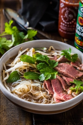 Easy Vietnamese pho noodle soup - Want to get a hearty bowl of Vietnamese pho noodle soup on the table within 30 minutes? Look no further! | omnivorescookbook.com
