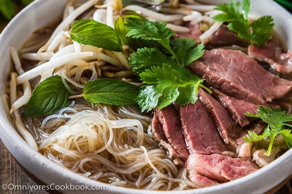 Easy Vietnamese pho noodle soup - Want to get a hearty bowl of Vietnamese pho noodle soup on the table within 30 minutes? Look no further! | omnivorescookbook.com