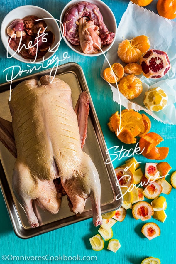 The Best Slow Roast Duck (A recipe from a chef) - The duck is stuffed with citrus, then slow cooked until the meat is falling off the bones and the skin perfectly crisped. | omnivorescookbook.com