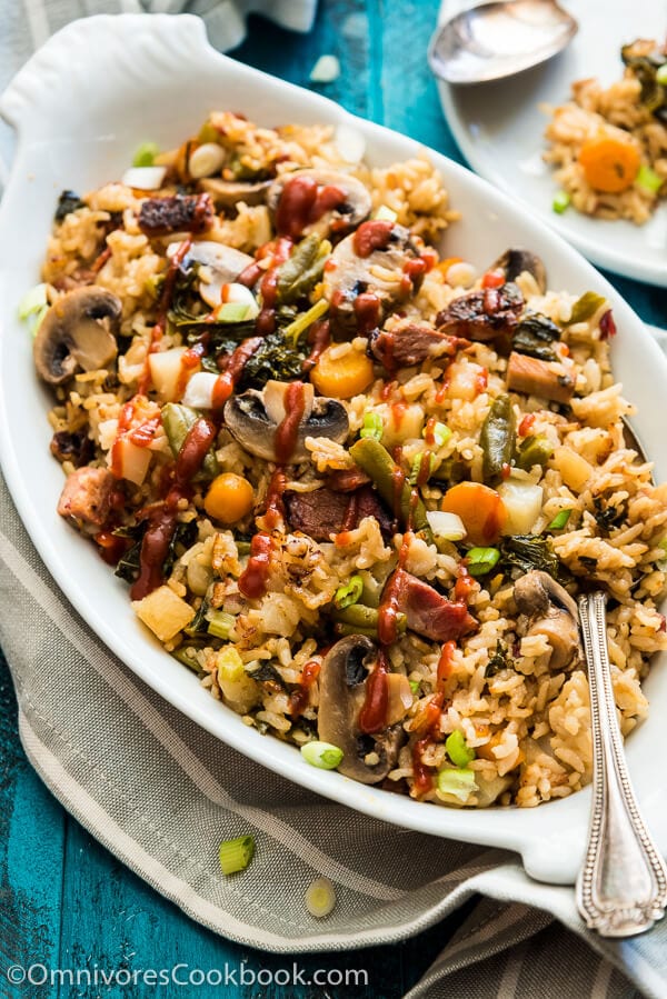 Instant Pot Rice Pilaf - A jambalaya-style rice that is loaded with veggies. You only need 10 minutes to prep, then you can sit back and relax. Your one-dish dinner will be ready in 15 minutes.