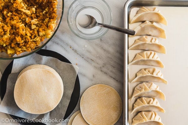 Carrot Dumplings - An elegant vegetarian dumpling that uses carrots, bamboo shoots, mushrooms, and eggs to create a fresh, moist, and rich filling.