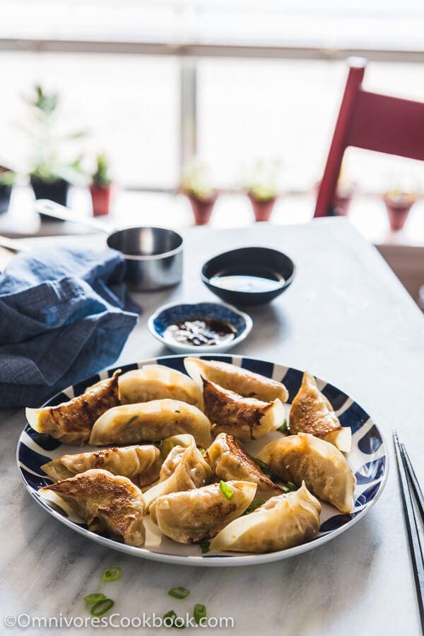 Carrot Dumplings - An elegant vegetarian dumpling that uses carrots, bamboo shoots, mushrooms, and eggs to create a fresh, moist, and rich filling. 