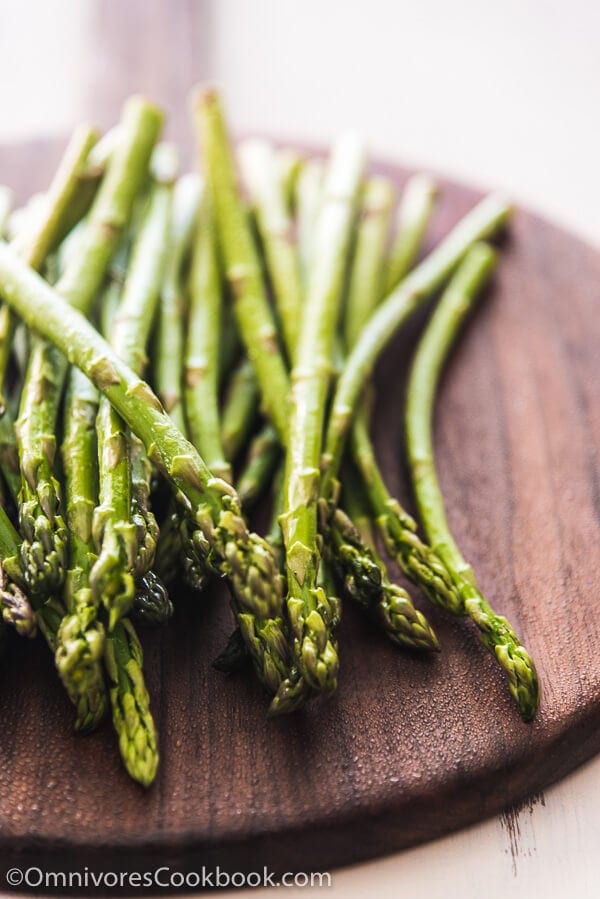 Hoisin Roasted Asparagus - Requires only two ingredients; the asparagus are perfectly charred, flavorful, and tender. You can either grill them or bake them in the oven.