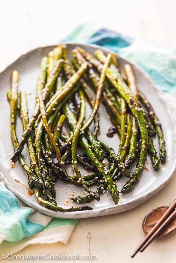 Hoisin Roasted Asparagus - Requires only two ingredients; the asparagus are perfectly charred, flavorful, and tender. You can either grill them or bake them in the oven.