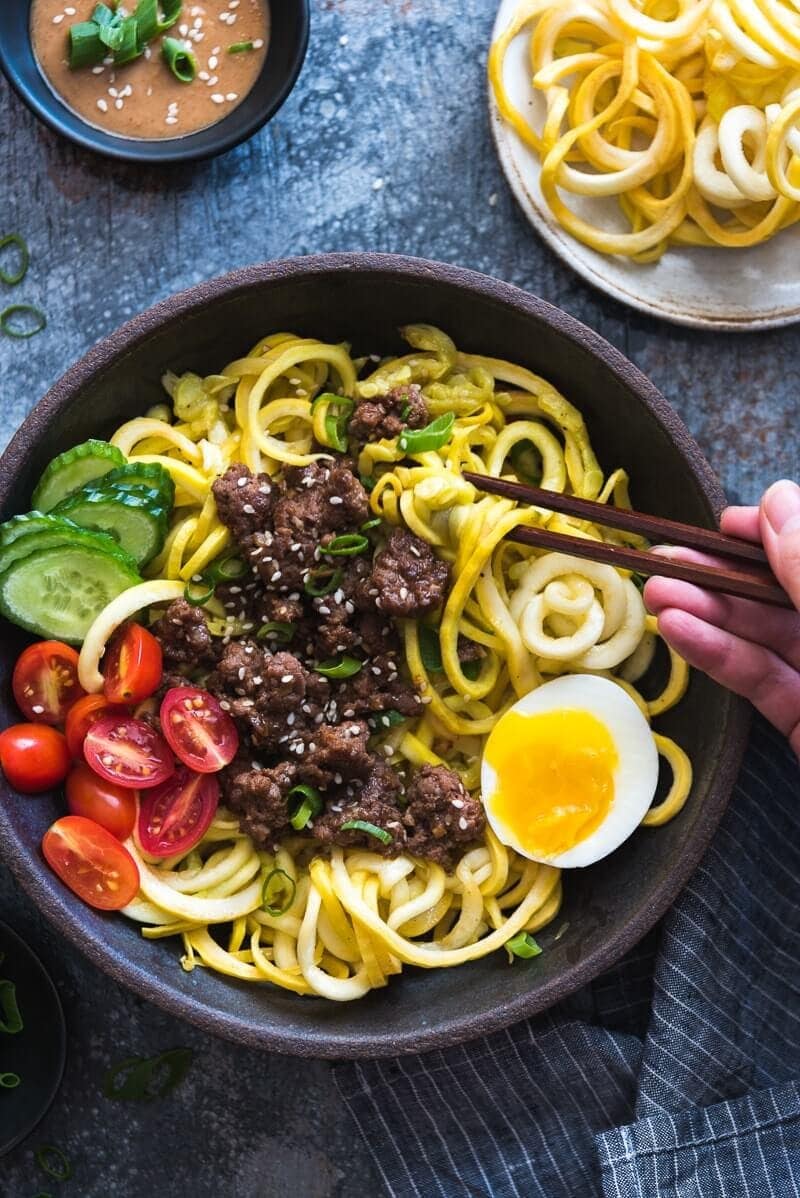 Sesame Beef Squash Noodle Bowl - A paleo-friendly one-bowl feast that is perfect for your weekday dinner. It is quick to cook, can be prepared ahead of time, and is balanced in nutrition.