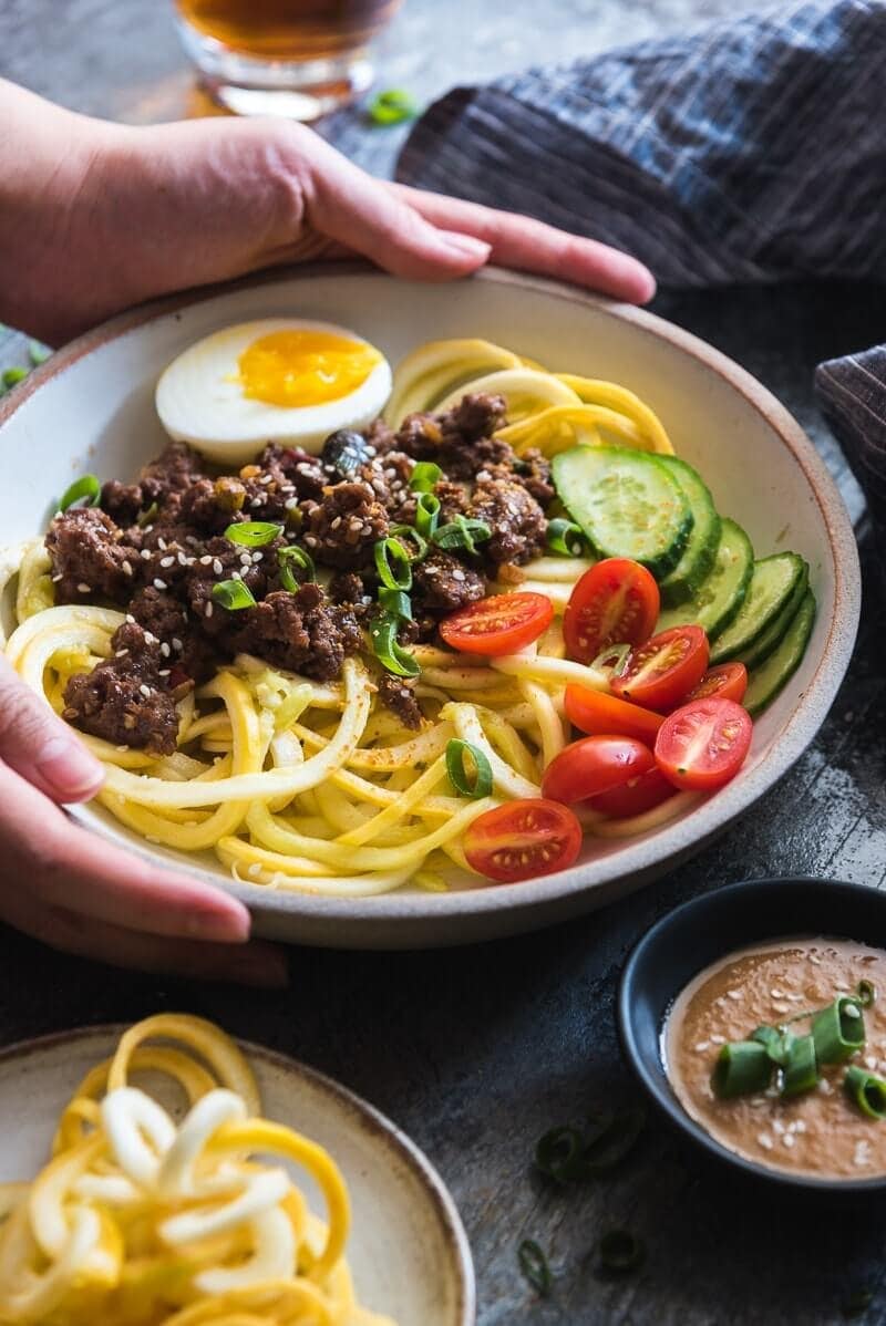 Sesame Beef Squash Noodle Bowl - A paleo-friendly one-bowl feast that is perfect for your weekday dinner. It is quick to cook, can be prepared ahead of time, and is balanced in nutrition. 