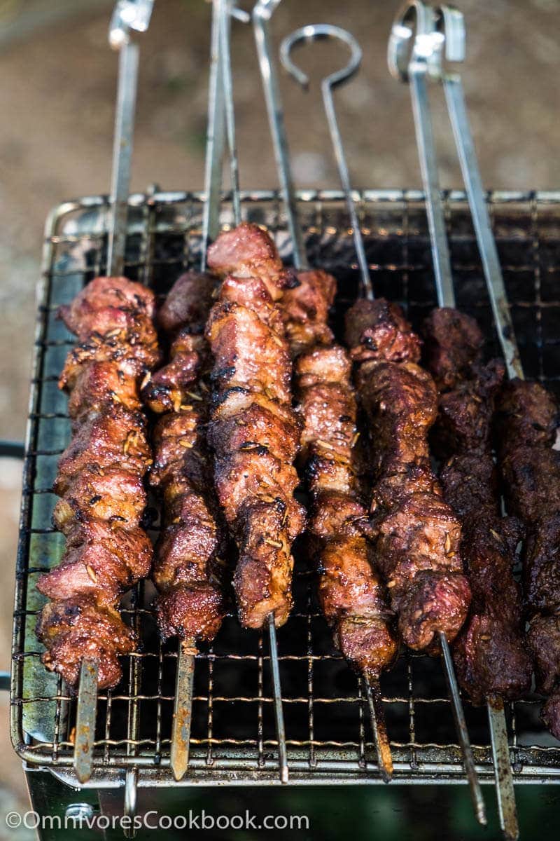 Grill steak on an electric stove. Pork neck fried on small electric grill.  Home cooking. Healthy barbecue. Catering to friends. Electric grilling.  Stock Photo