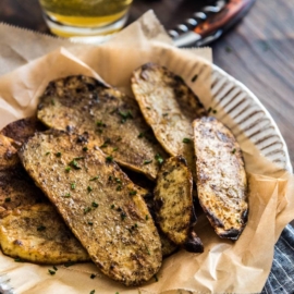 Cook the best grilled potato by slicing it finely, grill until blistered on the surface and creamy in texture. Add cumin and chili powder to spice it up.
