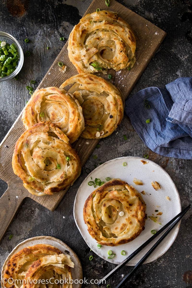 Learn how to cook the real-deal scallion pancakes that are light and crispy. Video and step-by-step pictures included.