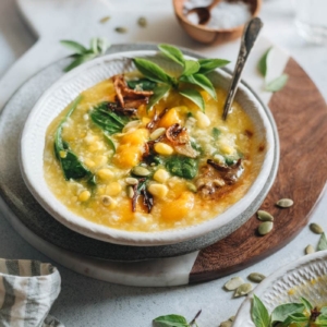 Manadonese porridge is fragrant, hearty, and loaded with nutrition. It’s the perfect side dish to warm your body and heart as the weather gets cooler. {Gluten-Free, Vegetarian}