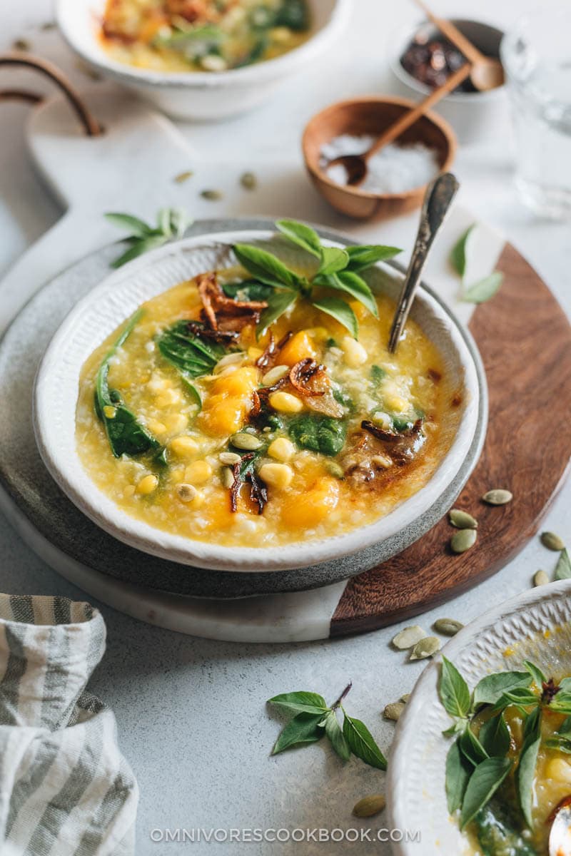 Manadonese porridge is fragrant, hearty, and loaded with nutrition. It’s the perfect side dish to warm your body and heart as the weather gets cooler. {Gluten-Free, Vegetarian}