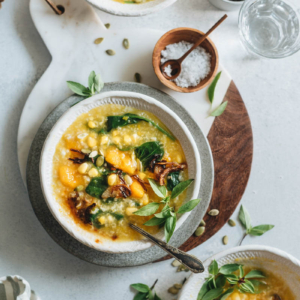 Tinutuan (Indonesian pumpkin porridge) is fragrant, hearty, and loaded with nutrition. It’s the perfect side dish to warm your body and heart as the weather gets cooler. {Gluten-Free, Vegetarian}