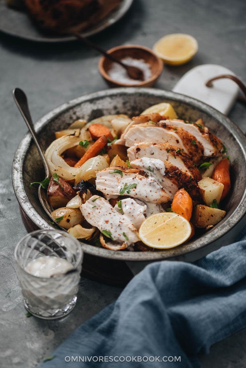 The chicken is roasted until perfectly charred and juicy inside, while the vegetables are tender and flavorful. It is a great weekend one-pan dinner that takes little effort to prepare. Drizzle with some creamy sauce and dinner is all set.