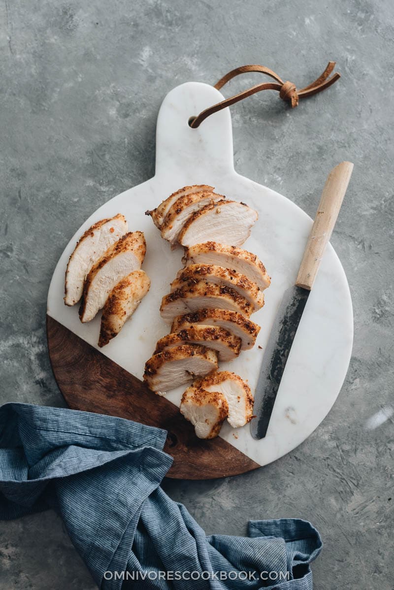 Slicing Sichuan Dry Rub Roast Chicken Breast - Tender, juicy chicken breast roasted with a rich, spicy dry rub. Only 30 minutes required, including prep and cooking. {Gluten-Free}