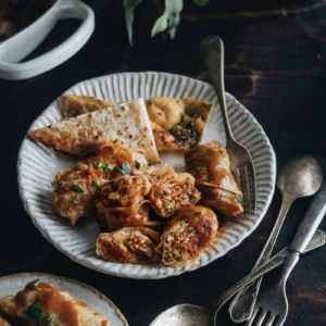 Cabbage Rolls with Tomato and Sumac Sauce (Lahana Sarması) - A lighter and more flavorful version of cabbage rolls with a rich and complex sauce. It is the most comforting dish for wintertime. {Gluten-Free}
