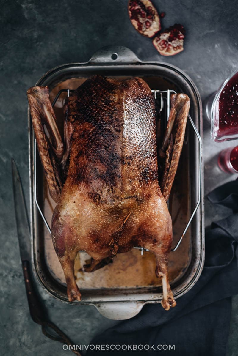 Slow Roast Goose With Black Currant Sauce - A perfect dish for your Thanksgiving or Christmas dinner, which you can make in advance with minimal hands-on time. The recipe yields extra juicy meat with crispy skin.