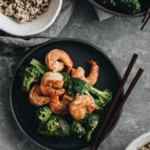Garlic Shrimp and Broccoli should be added to your weekday dinner menu because it’s so easy and fast to cook and is loaded with nutrition. {Gluten-Free adaptable}