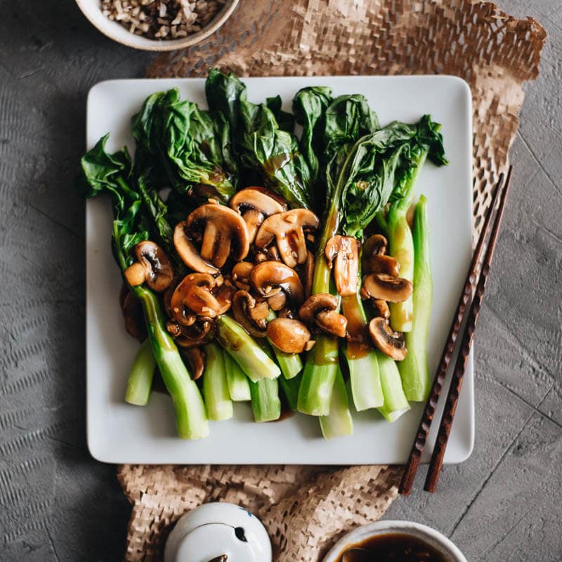 The Chinese broccoli is steamed and served with stir fried mushrooms and a scrumptious brown sauce. It’s a quick and delicious way to put plenty of veggies on your dinner table. {Vegetarian, Gluten-Free Adaptable}