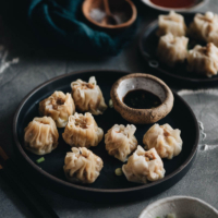 Learn how to make the famous dim sum classic, shumai - steamed dumplings filled with juicy pork and shrimp. It’s a perfect party food to make in advance and serve later.