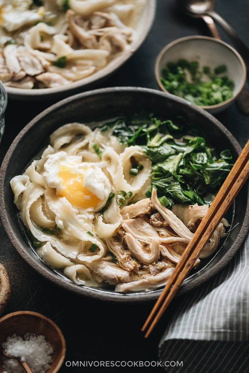 Close up of Instant Pot chicken noodle soup with soft poached egg
