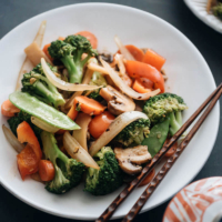 Chinese vegetable stir fry - Easy to make and so delicious, the crisp, tender veggies are tossed in a rich, savory sauce with plenty of aromatics. Serve it as a main or a side for a simple, healthy dinner. {Vegetarian, Gluten Free adaptable} #asian #recipes #sauce #lowcarb