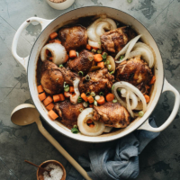 Filipino chicken adobo with onion and carrot