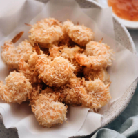 Easy Coconut Shrimp with sweet chili dipping sauce - Sweet, crispy, healthy, and delightful, my coconut shrimp are baked, not fried, to give you that texture you want in a healthier format. #glutenfree #recipe