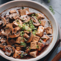 Vegetarian mapo tofu - So easy to make and irresistibly delicious. The tender tofu and mushrooms are simmered in a rich sauce that’s bursting with flavor. If you want the authentic Chinese restaurant experience, look no further! #vegan #recipe #healthy