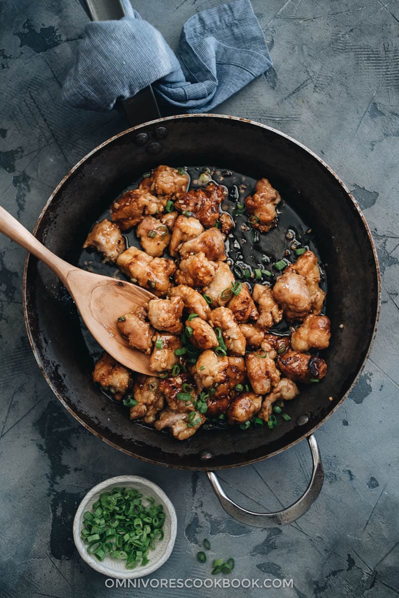 Crispy Chinese restaurant style honey chicken cooked in a skillet