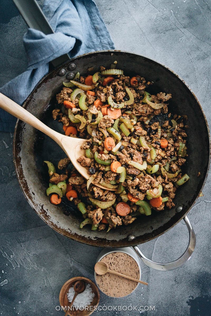 Ground beef stir fry with celery in a frying pan