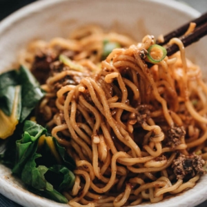 Vegan Dan Dan noodles - The tender noodles are served with a rich sauce that is nutty, spicy, and extra fragrant, with a hint of sweetness. It also comes with a vegan recipe for a flavorful “meat” topping that tastes great and clings to the noodles, just like real meat. Be careful, this dish is addictively tasty! {Gluten Free adaptable} #chinese #recipes