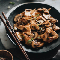 Mushroom chicken (Panda Express style) - The dish is very easy to make and perfect for a weekday dinner. The tender chicken bites are cooked in an aromatic savory sweet sauce with juicy mushrooms and crispy bamboo shoots. {Gluten-Free adaptable}